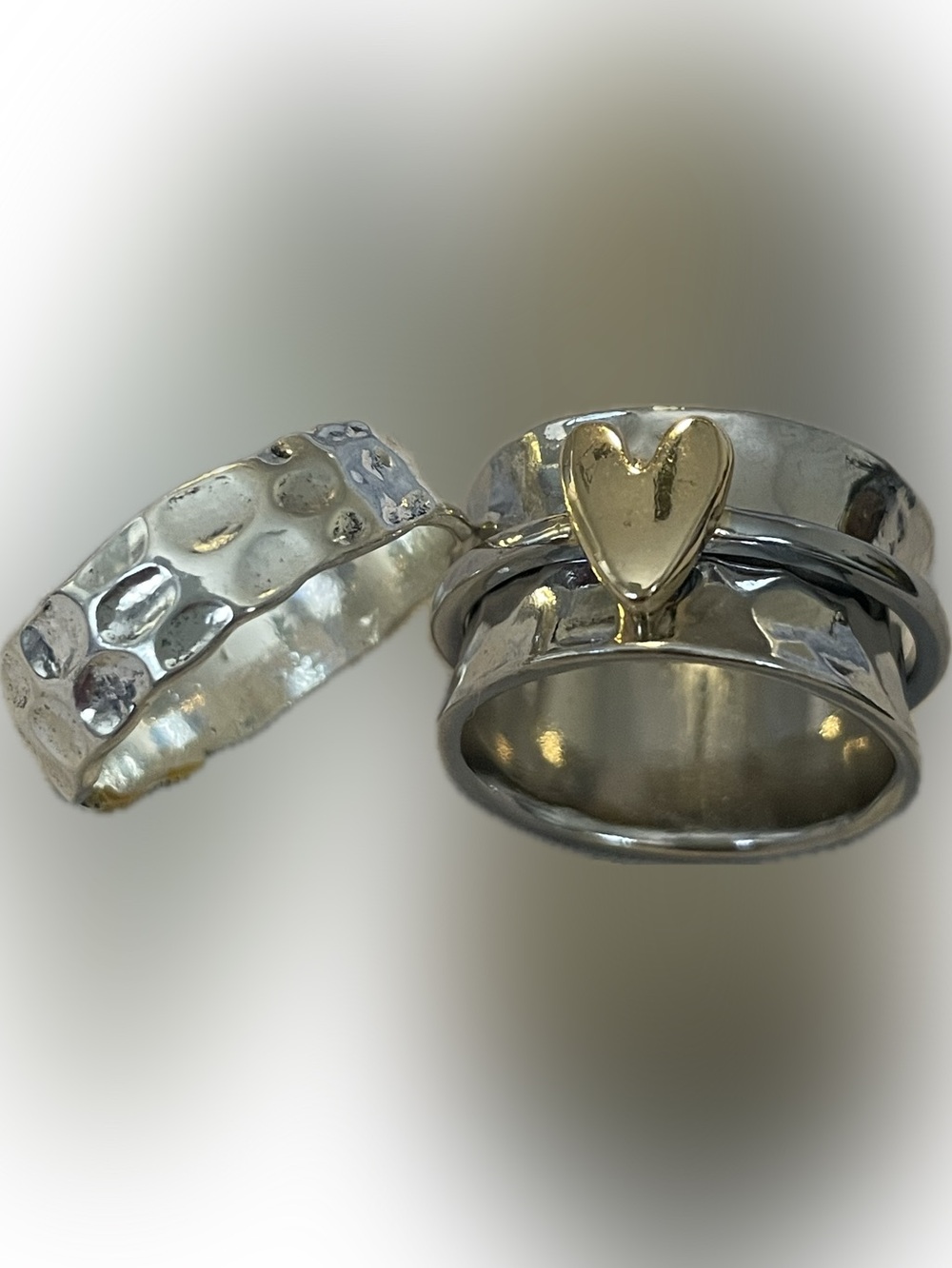 3 Rings sold together 
Silver Bands with Gold Heart Accent